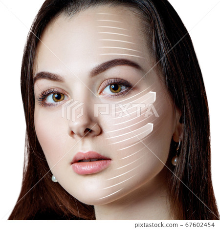 Woman brunette graphic lines shows facial lifting effect. Woman brunette graphic lines shows facial lifting effect. 67602454