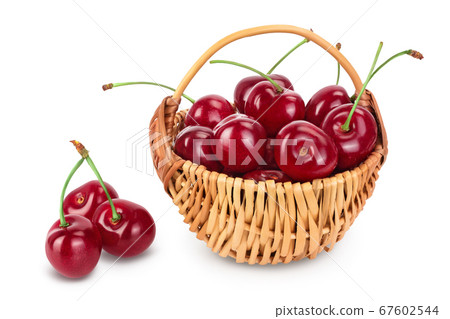 red sweet cherry in a wicker basket isolated on white background with clipping path and full depth of field 67602544