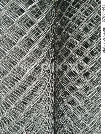 Roll of Metal steel wire mesh background Roll of Metal steel wire mesh background 67604448