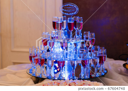 glasses with red and white wine in the restaurant for a holiday glasses with red and white wine in the restaurant for a holiday 67604748