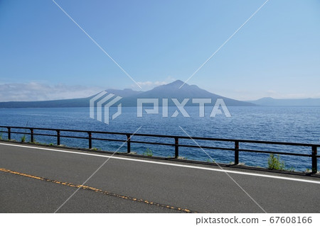 Windy Mt.Fuji and Tarumae seen from the national highway on the shore of Lake Shikotsu Windy Mt.Fuji and Tarumae seen from the national highway on the shore of Lake Shikotsu 67608166