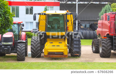 Modern combines at road at Kyiv 67608266