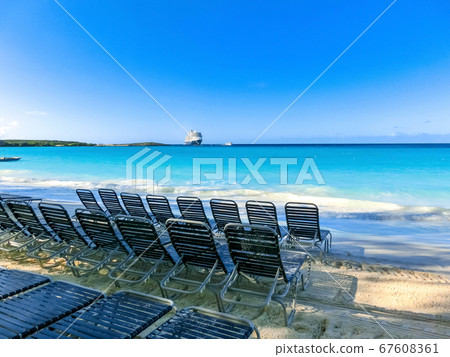 The view of empty beach on Half Moon Cay island at The view of empty beach on Half Moon Cay island at 67608361