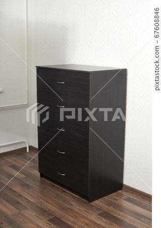 Wood furniture. Wooden dresser in room. 67608846