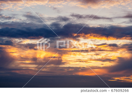 Dramatic sunset in orange and violet colors Dramatic sunset in orange and violet colors 67609266