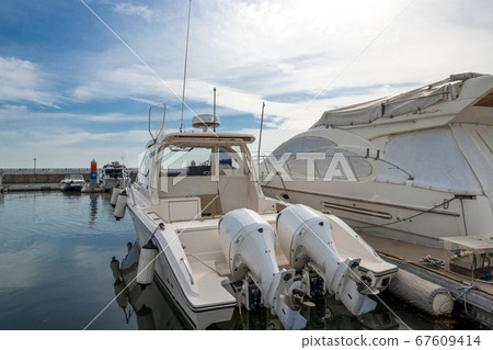 Yachts moored at the mooring Yachts moored at the mooring 67609414
