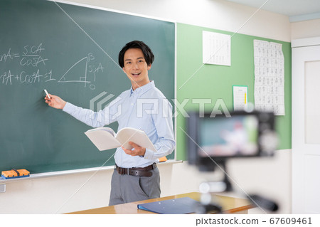 Online learning A young male teacher delivering classes Online learning A young male teacher delivering classes 67609461