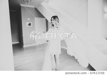 Portrait of a beautiful fashion bride, sweet and sensual. Wedding make up and hair 67611598