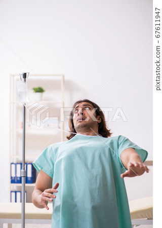Young mad man in the hospital Young mad man in the hospital 67611947