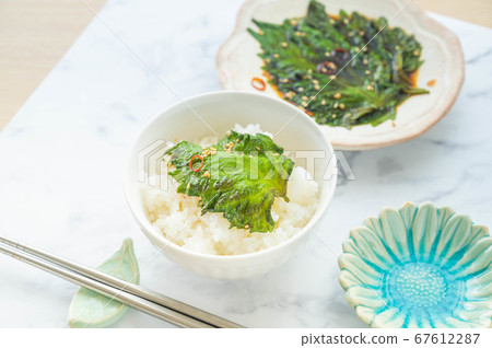 Large leaf soy sauce pickled on rice Large leaf soy sauce pickled on rice 67612287