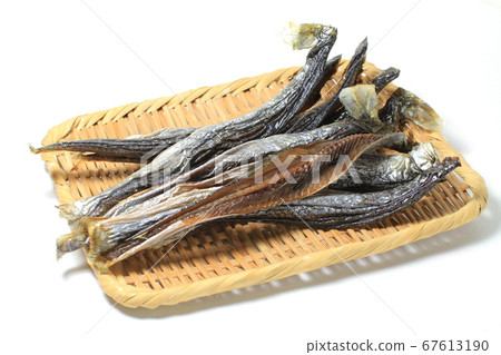 Dried fish, sliced herring, white background Dried fish, sliced herring, white background 67613190
