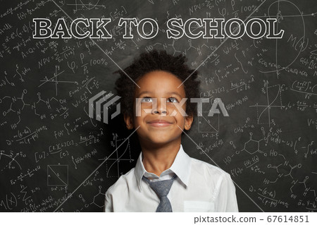 Smart African American child student boy smiling. 67614851