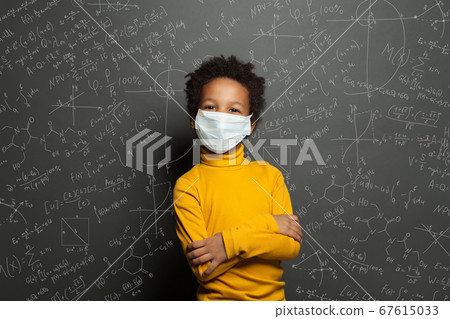 Successful black child boy student in protective 67615033