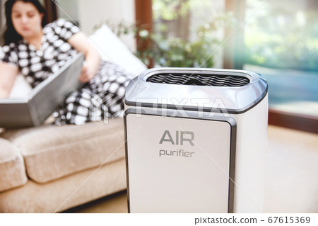 Air purifier cleans up air Air purifier cleans up air 67615369