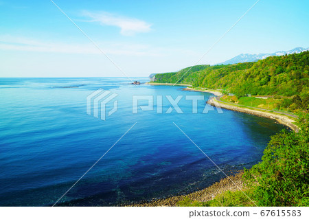 Sea of Okhotsk and coastline seen from the vicinity of Oshinko Shinno Falls 67615583