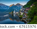 Classic view of Hallstatt with ship at sunrise, 67615976