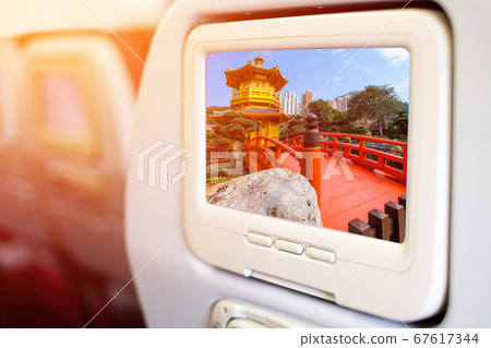 Aircraft monitor in front of passenger seat 67617344