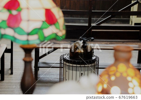 Old post office waiting room warmed by the stove 67619663