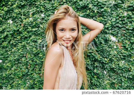 Portrait of smiling attractive woman 67620716