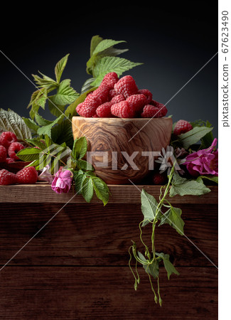 Summer still life with raspberries, meadow grasses 67623490