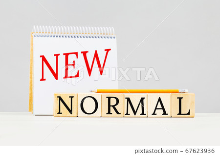 New Normal text on notepad and building blocks 67623936