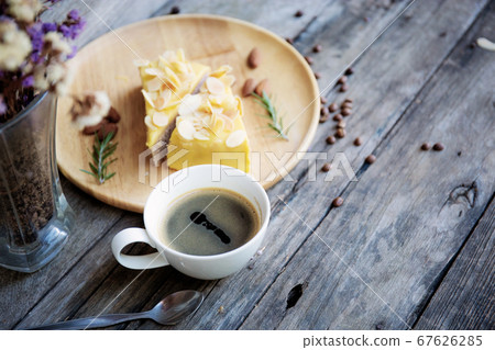 Coffee cup and cake. Coffee cup and cake. 67626285