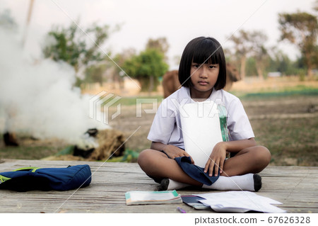 Asian girl in countryside. Asian girl in countryside. 67626328