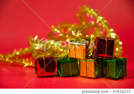 stack of gift box on red background stack of gift box on red background 67628275