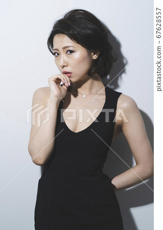 A woman in a dress A woman in a dress 67628557