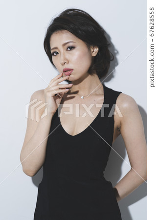 A woman in a dress A woman in a dress 67628558