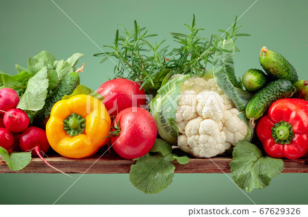 Various fresh raw vegetables, frontal view. Various fresh raw vegetables, frontal view. 67629326