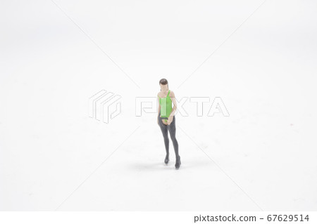 a fun of scale human figure on the board 67629514