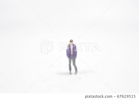 a fun of scale human figure on the board 67629515