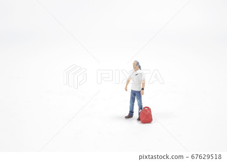 a fun of scale human figure on the board 67629518