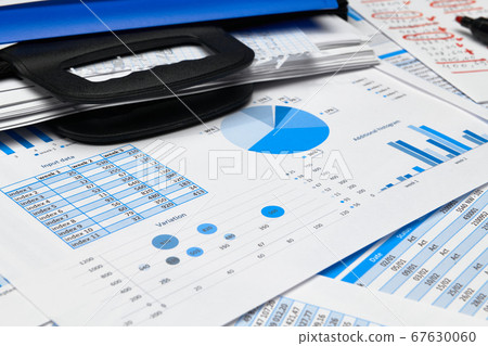 business office desk closeup - financial reports, 67630060