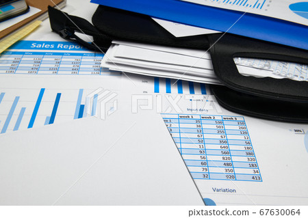 business office desk closeup - financial reports, 67630064