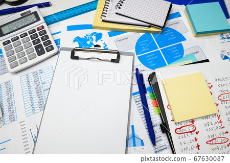 business office desk closeup - financial reports, business office desk closeup - financial reports, 67630087