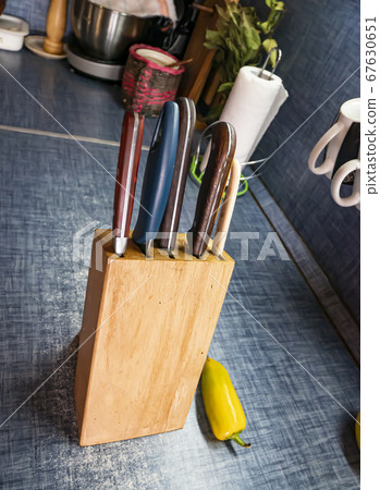 Set of kitchen knives on the table. Set of kitchen knives on the table. 67630651