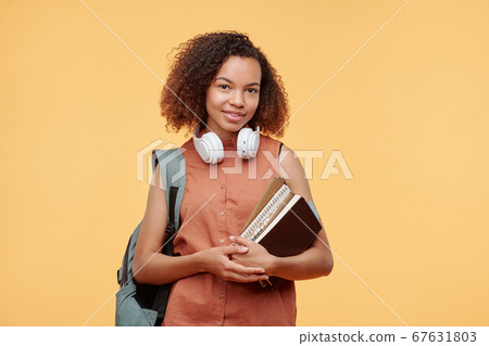 Student girl with books Student girl with books 67631803