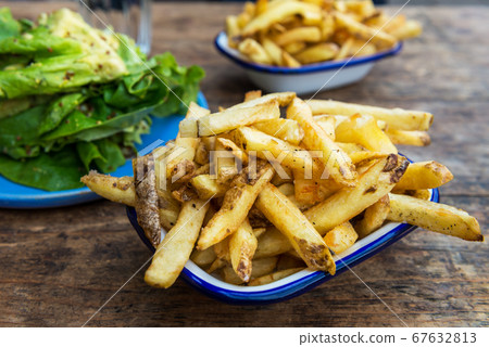 French Fries with Avocado and Mustard Salad 67632813