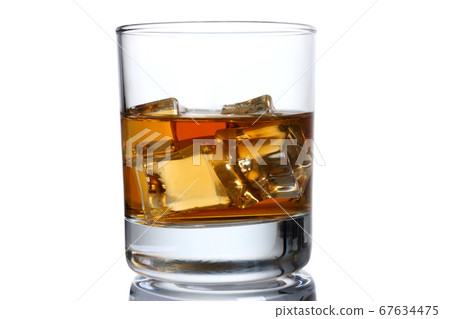 Classic glass of single malt scotch with ice Classic glass of single malt scotch with ice 67634475