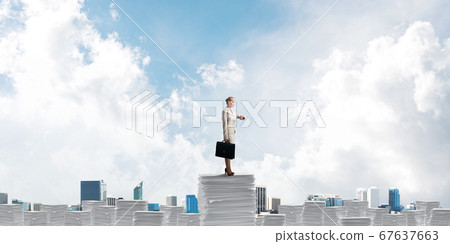 Successful confident business woman in suit. 67637663