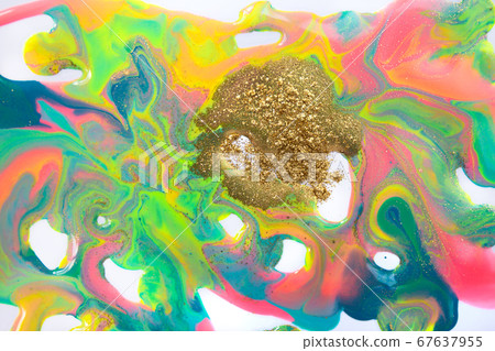 Fluorescent colorful liquid inks background with gold glitter particles. Marble imitation. 67637955
