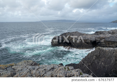 The coastline at Dawros in County Donegal - Ireland. 67637977