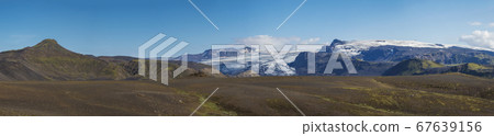Panoramic landscape with eyjafjallajokull glacier tongue, Markarfljot river and green hills. Fjallabak Nature Reserve, Iceland. Summer blue sky 67639156