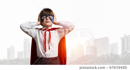 Kid girl superhero against cityscape background annoyed by city sounds 67639480