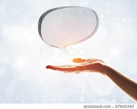 Concept of communication by glass empty chat icon on gray background Concept of communication by glass empty chat icon on gray background 67640340