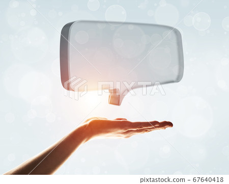 Concept of communication by glass empty chat icon on gray background 67640418