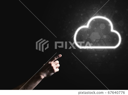 Digital cloud icon as symbol of wireless connection on dark background Digital cloud icon as symbol of wireless connection on dark background 67640776
