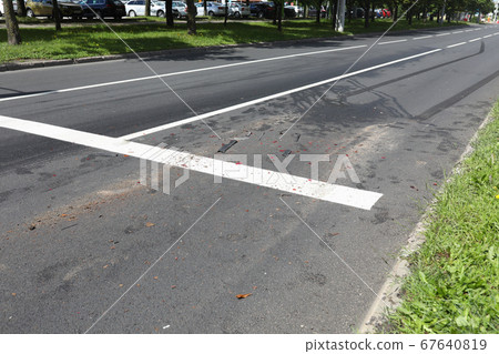 Braking distance on road after an accident closeup Braking distance on road after an accident closeup 67640819